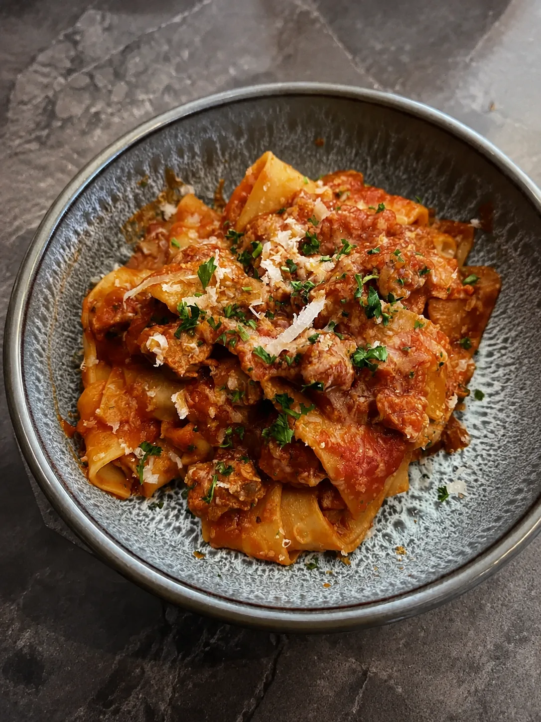 A bowl of rich lamb ragu pasta